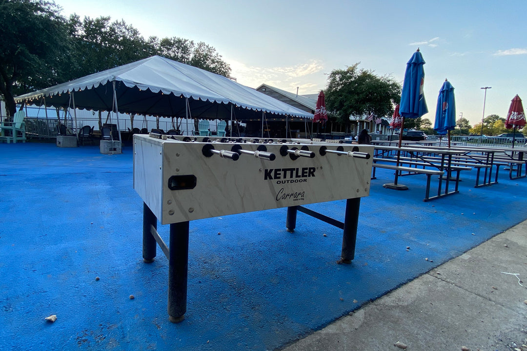 Kettler Foosball Table in a restaurants outdoor patio area. 