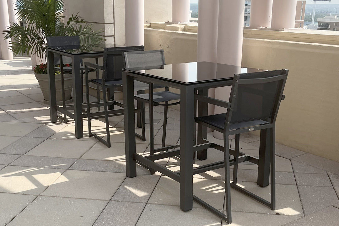 Kettler Patio furniture in a commercial covered outdoor patio area.