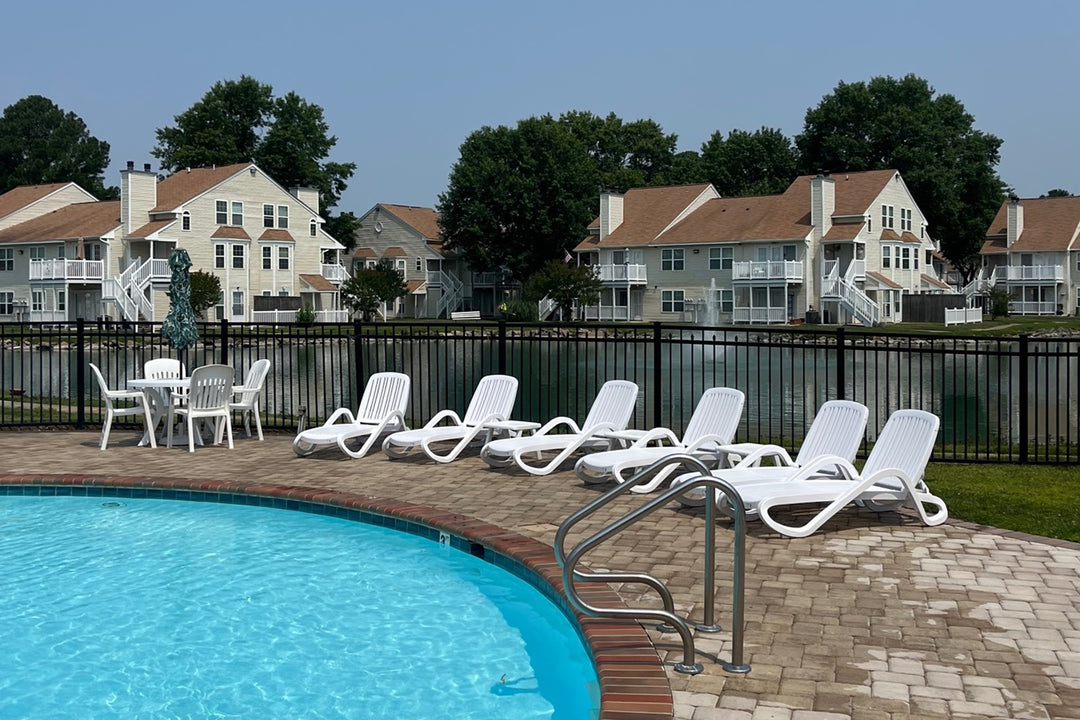 Kettler Patio furniture in a commercial outdoor patio pool area. 