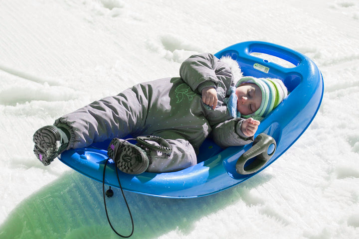 lifestyle image of child in toboggan 