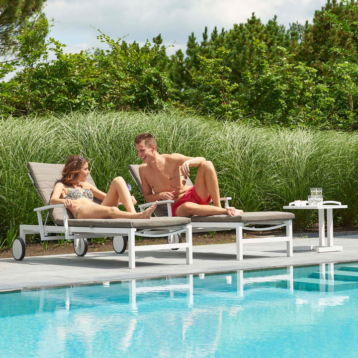 Soak up the sun in style in the Anabel Sun Lounger. The sleek frame goes from upright to flat with ease thanks to the adjustable high back and collapsible armrests. Transport wheels makes it easy to be moved around your patio to get all the sun you prefer