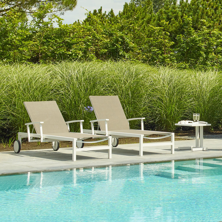 Soak up the sun in style in the Anabel Sun Lounger. The sleek frame goes from upright to flat with ease thanks to the adjustable high back and collapsible armrests. Transport wheels makes it easy to be moved around your patio to get all the sun you prefer