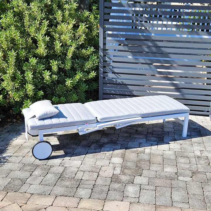 Soak up the sun in style in the Anabel Sun Lounger. The sleek frame goes from upright to flat with ease thanks to the adjustable high back and collapsible armrests. Transport wheels makes it easy to be moved around your patio to get all the sun you prefer