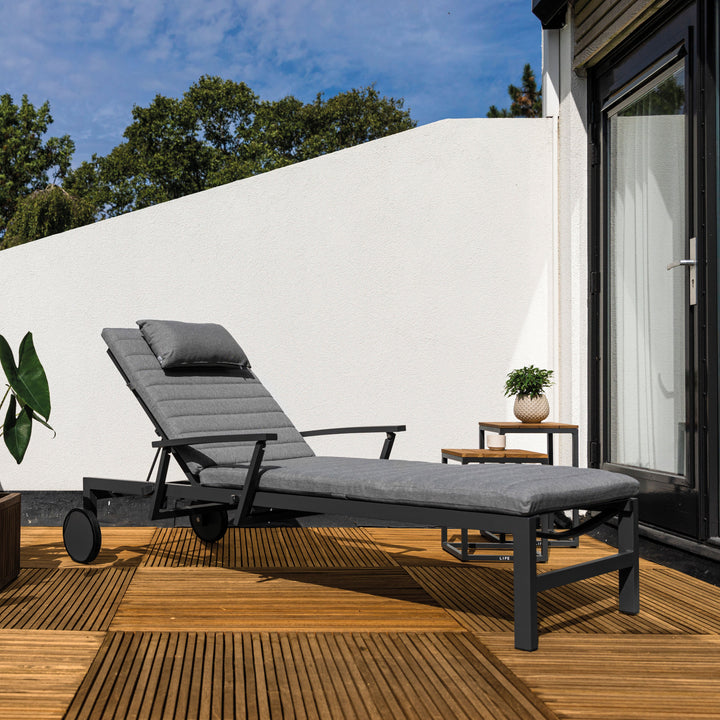 Soak up the sun in style in the Anabel Sun Lounger. The sleek frame goes from upright to flat with ease thanks to the adjustable high back and collapsible armrests. Transport wheels makes it easy to be moved around your patio to get all the sun you prefer