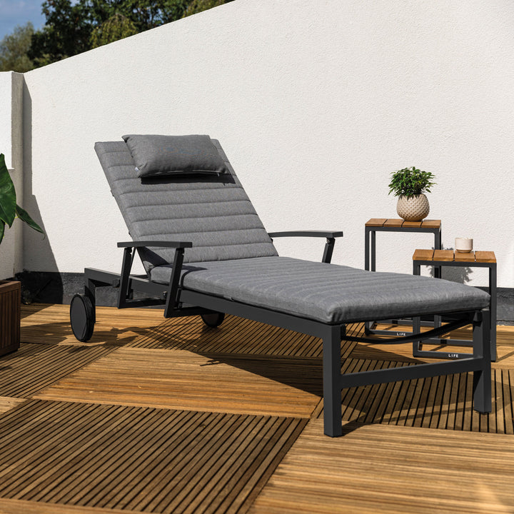 Soak up the sun in style in the Anabel Sun Lounger. The sleek frame goes from upright to flat with ease thanks to the adjustable high back and collapsible armrests. Transport wheels makes it easy to be moved around your patio to get all the sun you prefer