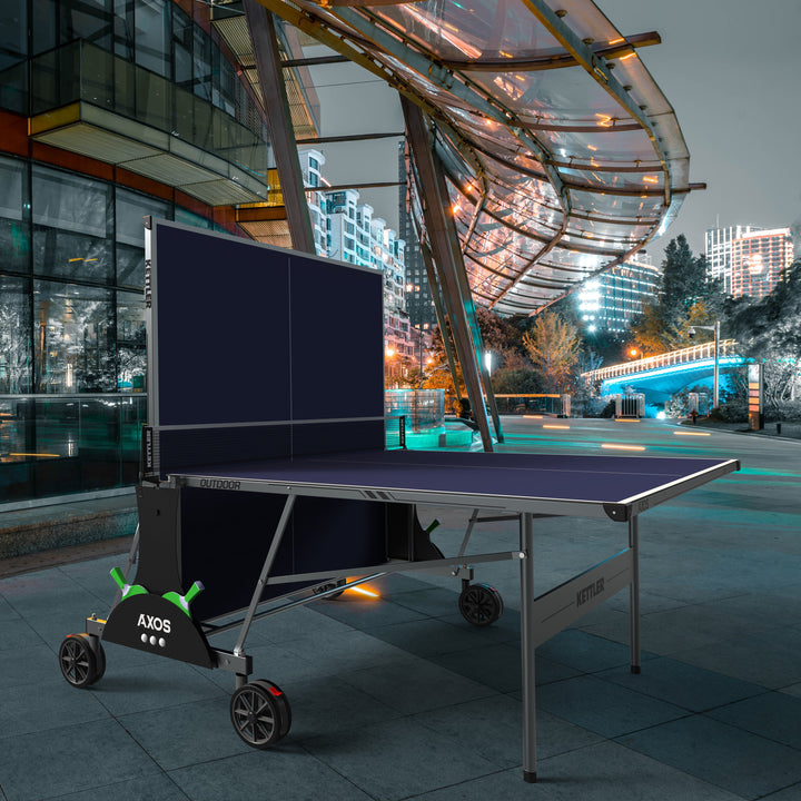 Axos Outdoor Table Tennis Table in playback position on hotel patio at night