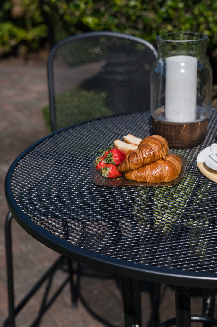 KETTLER wrought iron bar set outside on patio