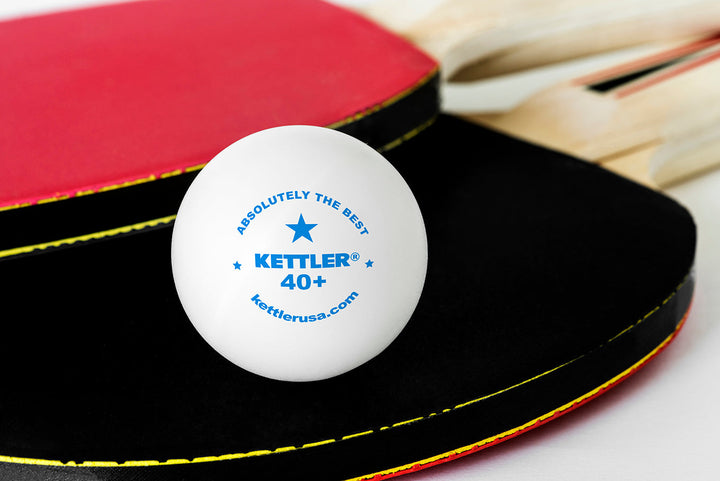 Lifestyle shot of one star ping pong ball with paddles