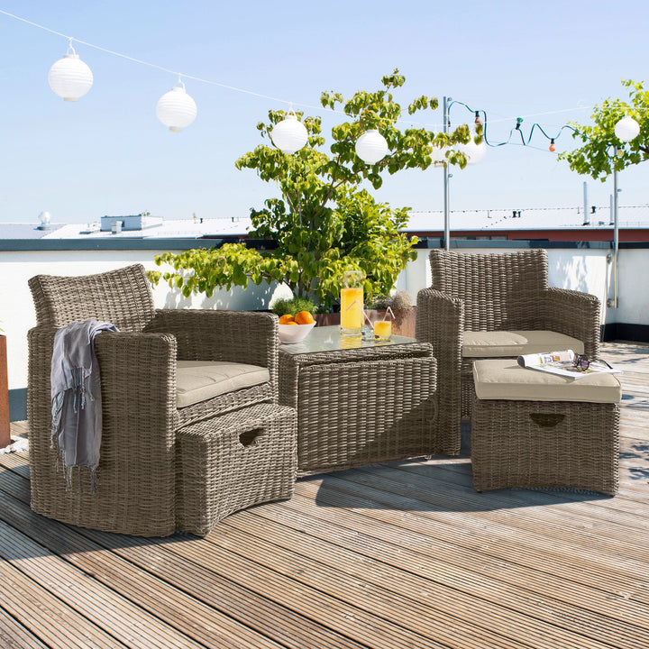 The handwoven wicker Cupido Set combines all the comfort of a luxurious lounge set without the large footprint.