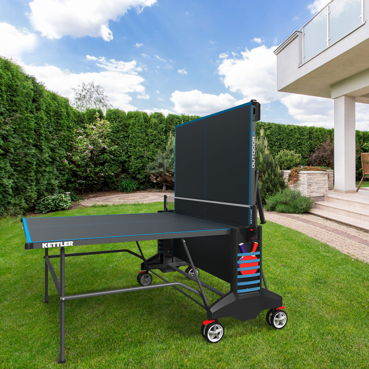 The KETTLER OUTDOOR 6 offers state-of-the-art technology and all the brand’s well-known features. Its KETT-TEC6 outdoor weatherproof top provides durability for outdoor use and offers high performance with true ball bounce. The OUTDOOR 6 includes a one-hand locking mechanism for safe, secure and compact storage, a permanent net system, true play back position for solo play and large wheels with off-road tread for easy transport.