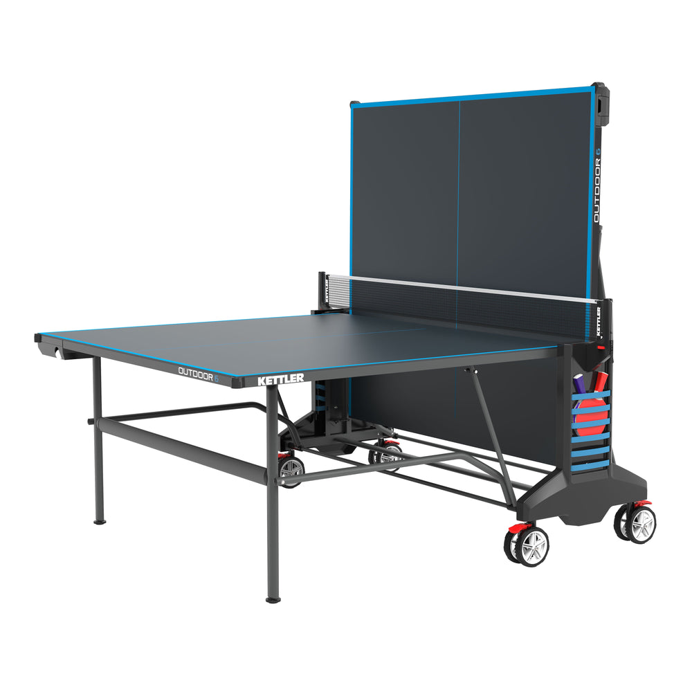 The KETTLER OUTDOOR 6 offers state-of-the-art technology and all the brand’s well-known features. Its KETT-TEC6 outdoor weatherproof top provides durability for outdoor use and offers high performance with true ball bounce. The OUTDOOR 6 includes a one-hand locking mechanism for safe, secure and compact storage, a permanent net system, true play back position for solo play and large wheels with off-road tread for easy transport.
