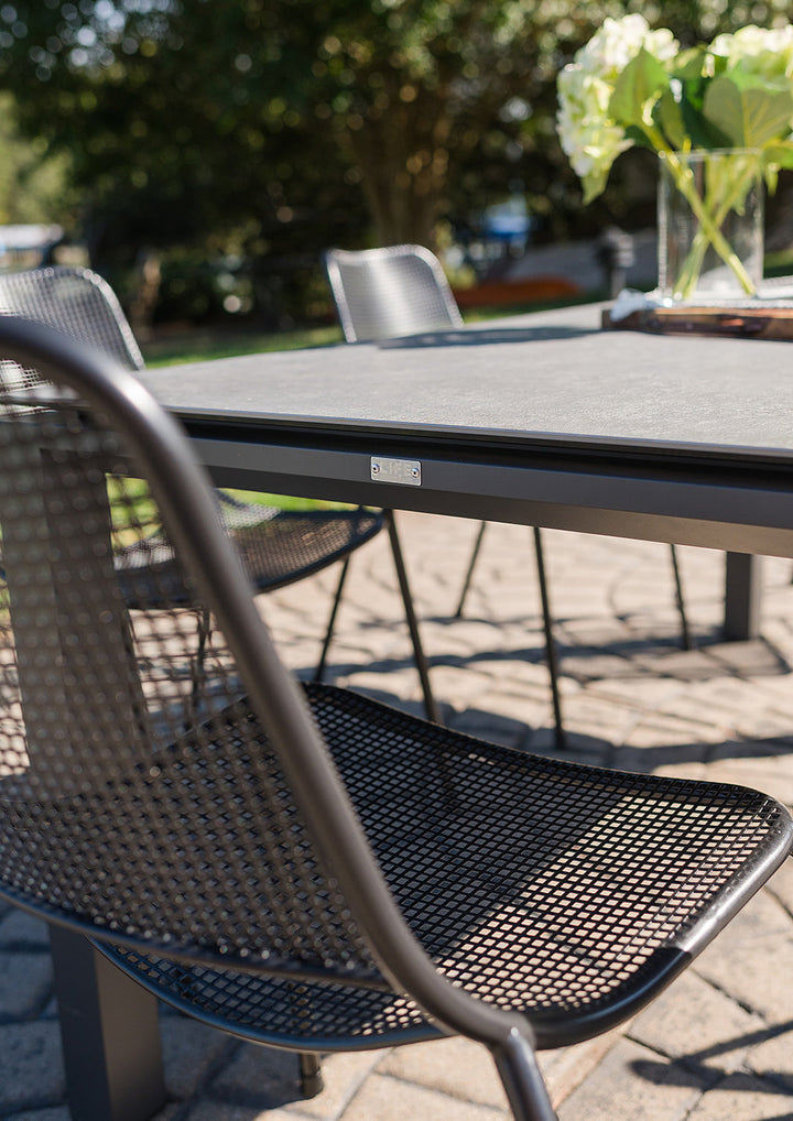 The popular Metro Armless Chair offers a stylish, modern look and boasts a comfy seating position with a curved back and seat. The sturdy chair withstands outdoor weather all year round and stacks for easy storage. The Metro Armless Chair is at home to both a residential or commercial setting.  Mix and match the Metro chair with KETTLER’s wide range of steel mesh outdoor tables.
