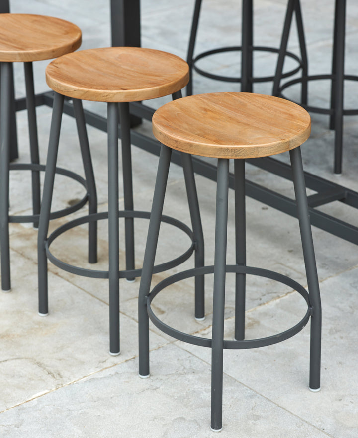 With its powder coated construction and 100% Indonesian SVLK certified teak tops, the Nevada Bar Set is a true work of art.  The combination of durable aluminum frame and warm robust teak gives it an eye-catching industrial look that will surely grab the attention of the most disconcerting critic.
