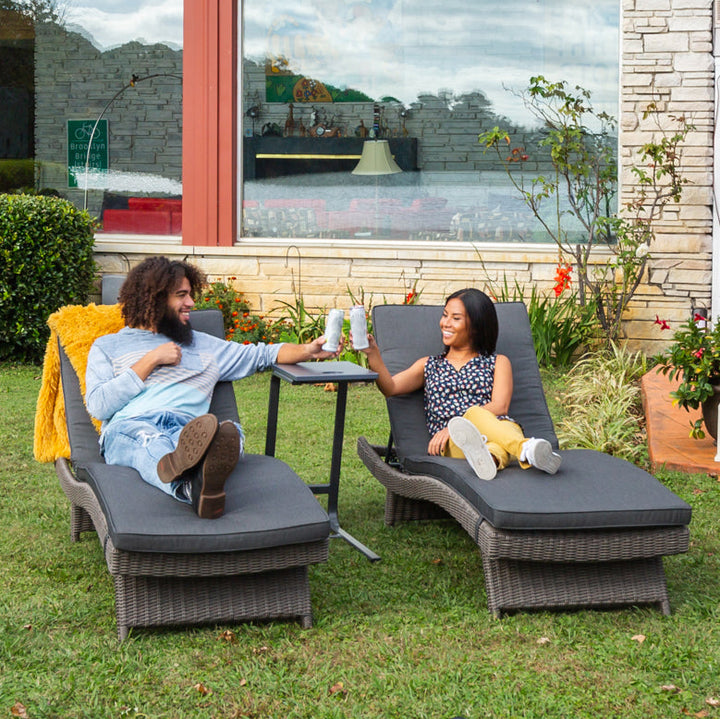 Lifestyle image of the KETTLER Palma Wicker Multi-Position Lounger