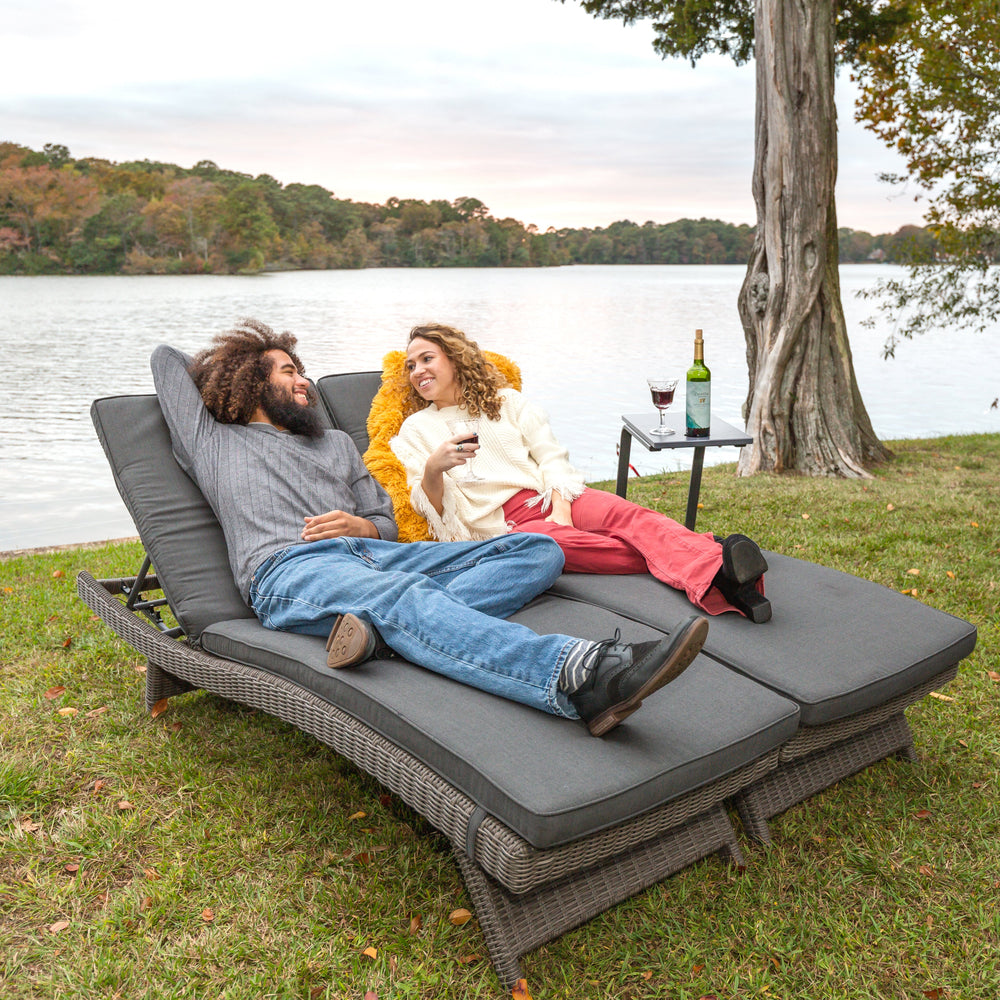Lifestyle image of the KETTLER Palma Wicker Multi-Position Lounger