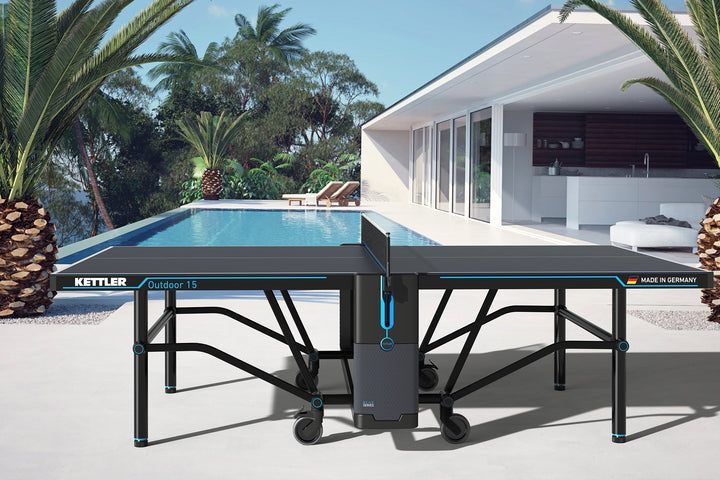 Made in Germany outdoor table tennis table in play position in backyard