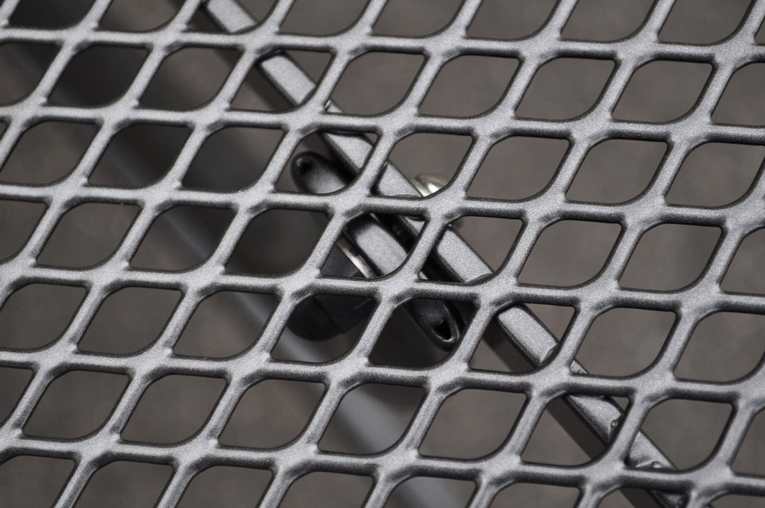 close up detail shot of wrought iron mesh