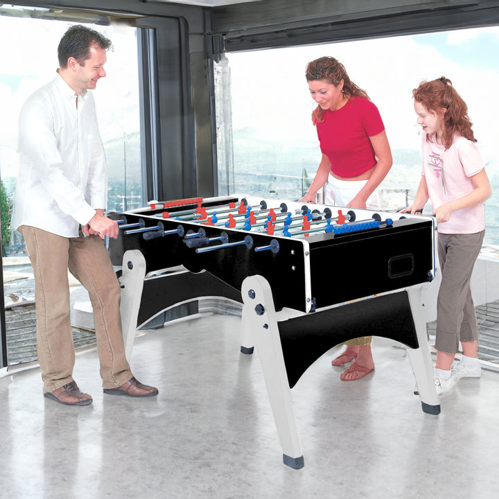 Family playing on the FOLDY Evolution Indoor Foosball Table