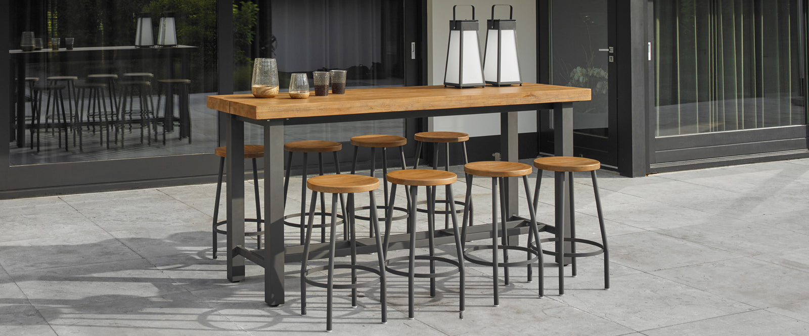 Bar height dining with the Nevada Bar Height Table with teak top and Canada Bar Stools with teak tops. From Life Outdoor Living. 