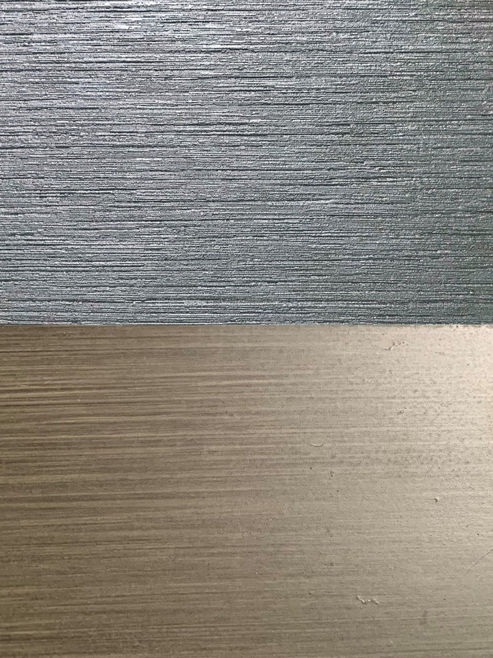 Poly (top) and brushed metal (bottom) top comparison